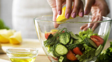 close up lemon juice veggies